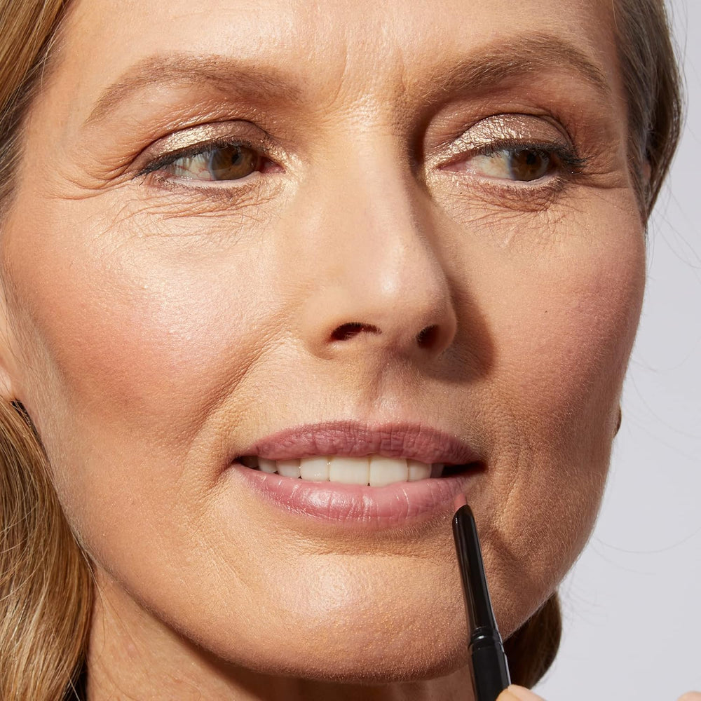 LAURA GELLER NEW YORK creamy texture stroke demonstrating smooth glide and coverage