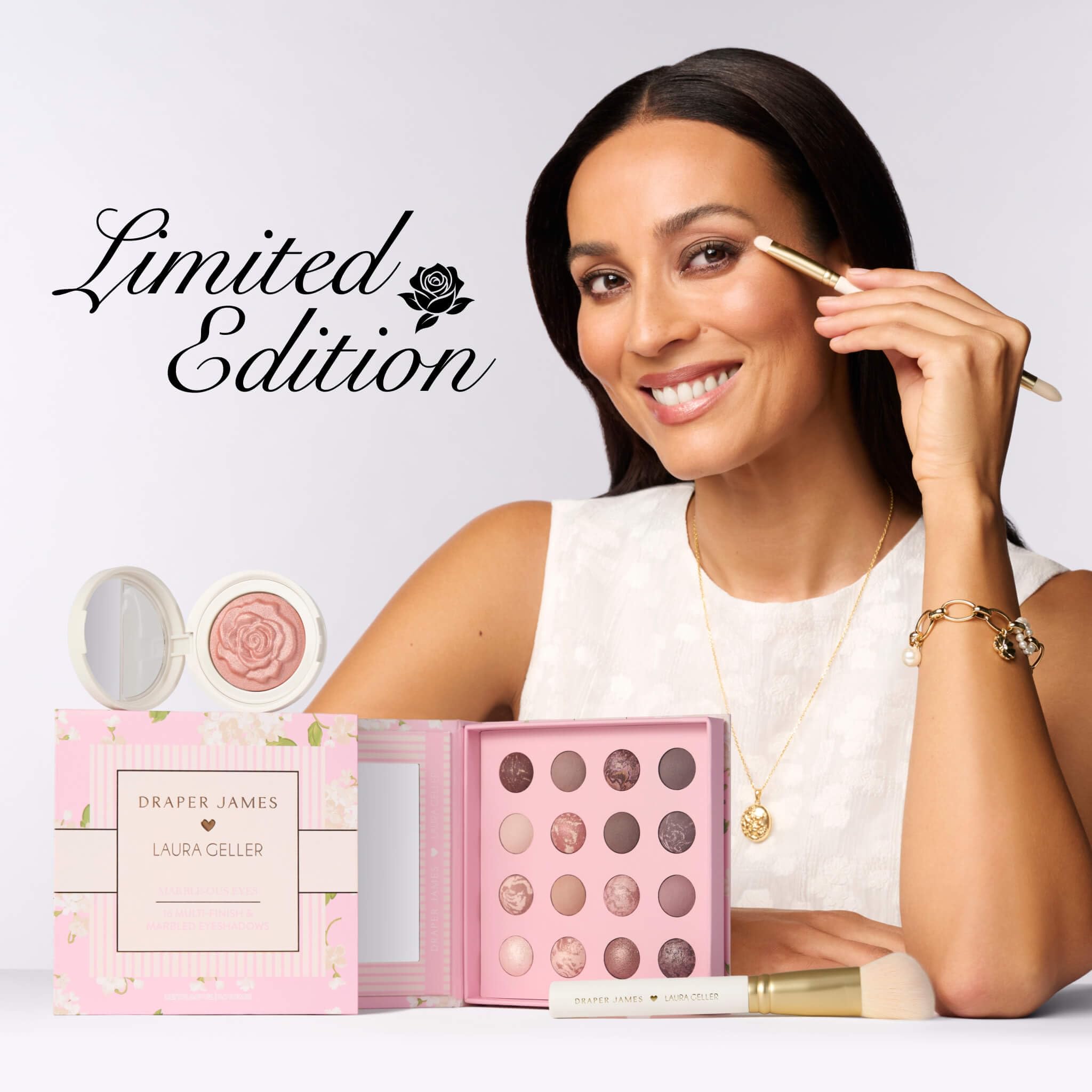 LAURA GELLER NEW YORK open compact next to brush showing product packaging