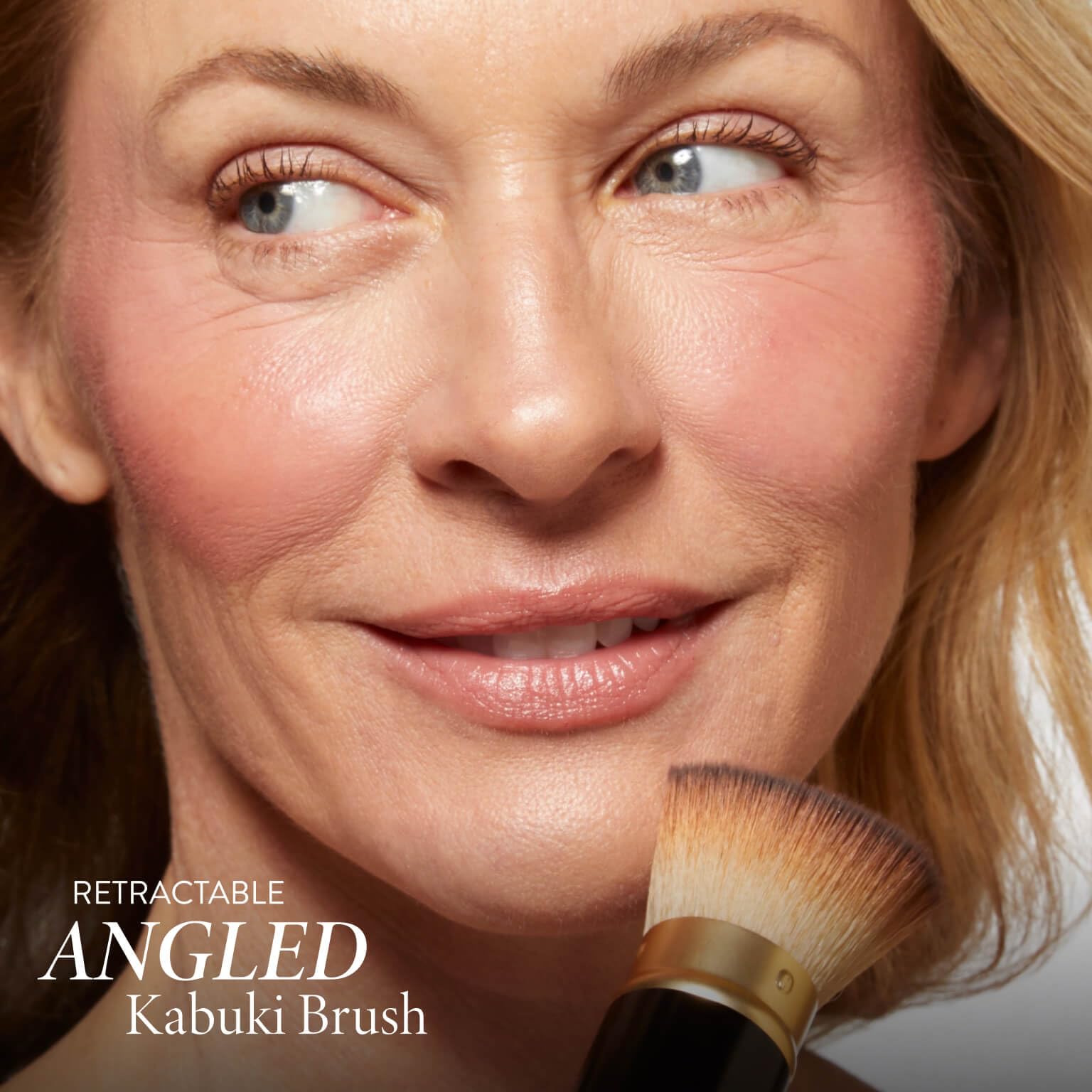 LAURA GELLER NEW YORK powder foundation swatch close-up showing smooth buildable finish