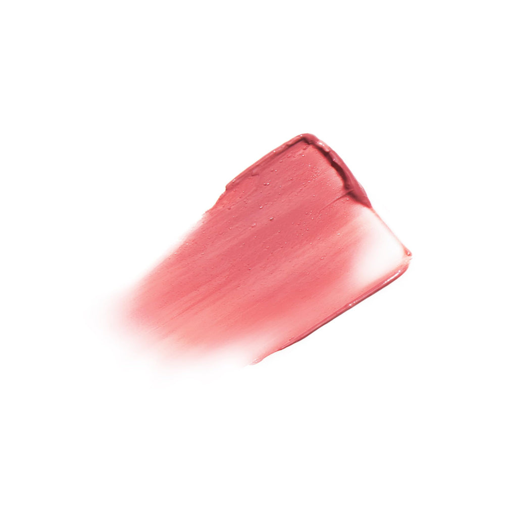 LAURA GELLER NEW YORK lipstick swiped on lips, showing wearable rose-pink finish