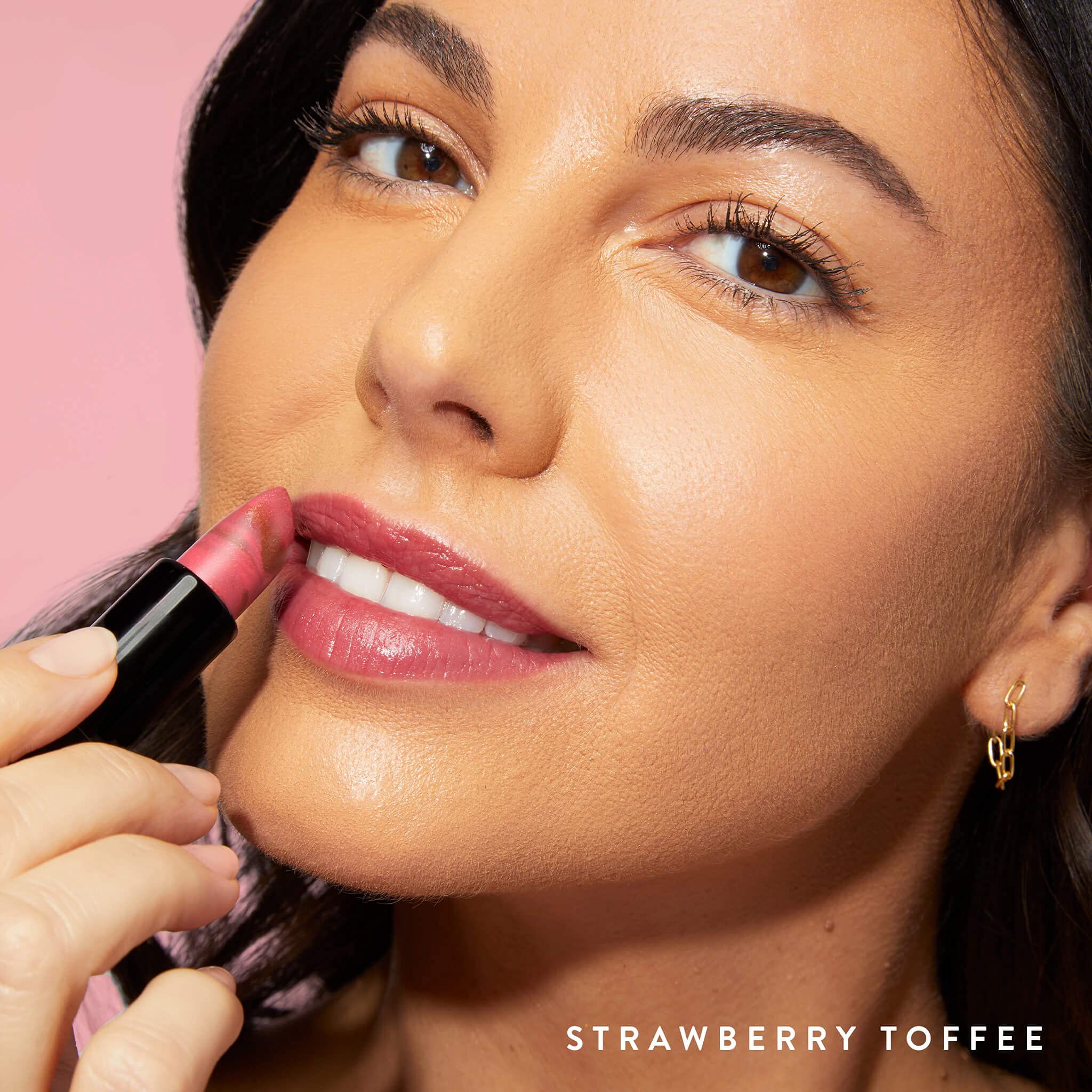 LAURA GELLER NEW YORK texture on fingertip, demonstrating creamy glide and hydration