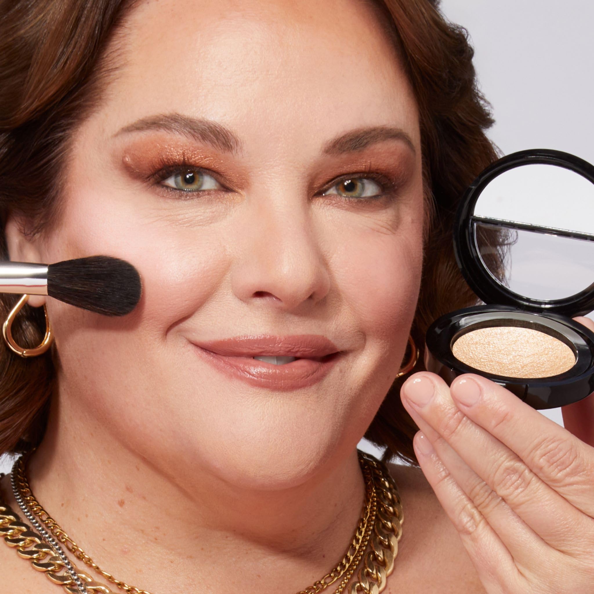 LAURA GELLER NEW YORK top-down open powder showing smooth domed surface