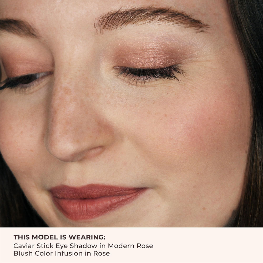 Laura Mercier blush applied on model cheeks showing natural flushed finish