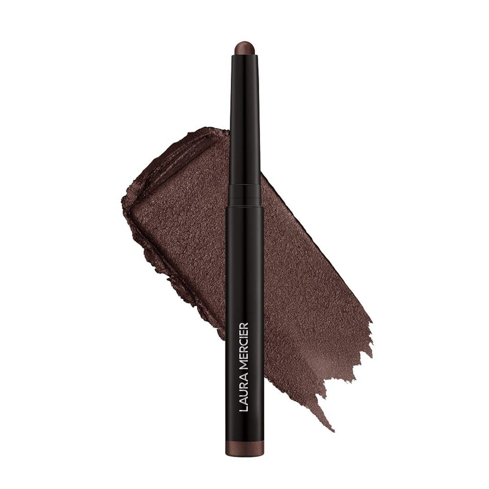 Laura Mercier front-of-stick showing compact shimmer and travel convenience