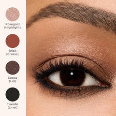 Laura Mercier swatch on skin showing rich cocoa shimmer payoff
