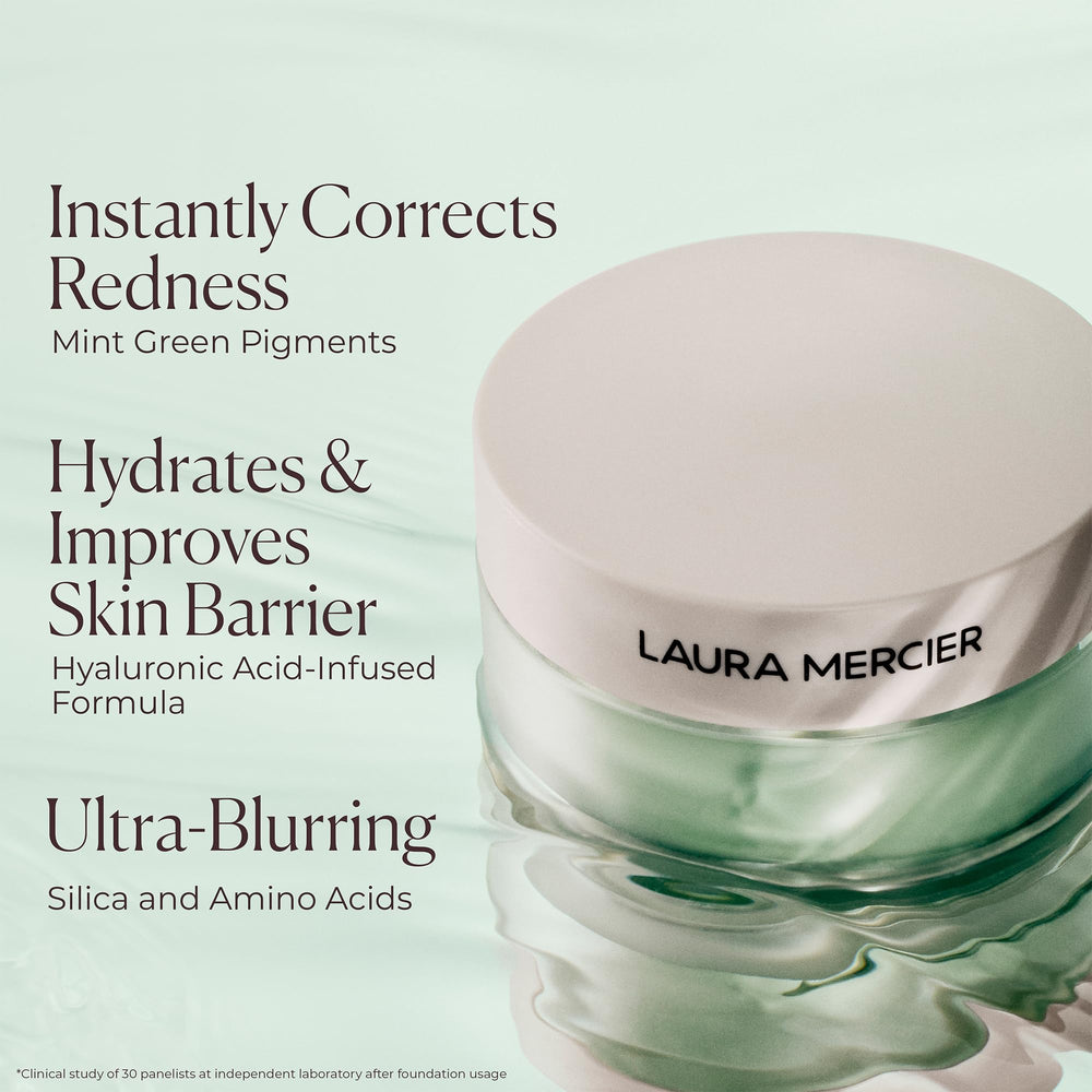 Laura Mercier powder next to foundation bottle illustrating layering benefit