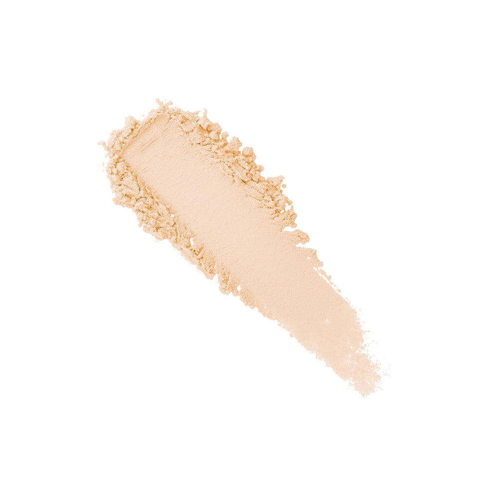 Laura Mercier powder application with velour puff demonstrating long-wear setting benefit