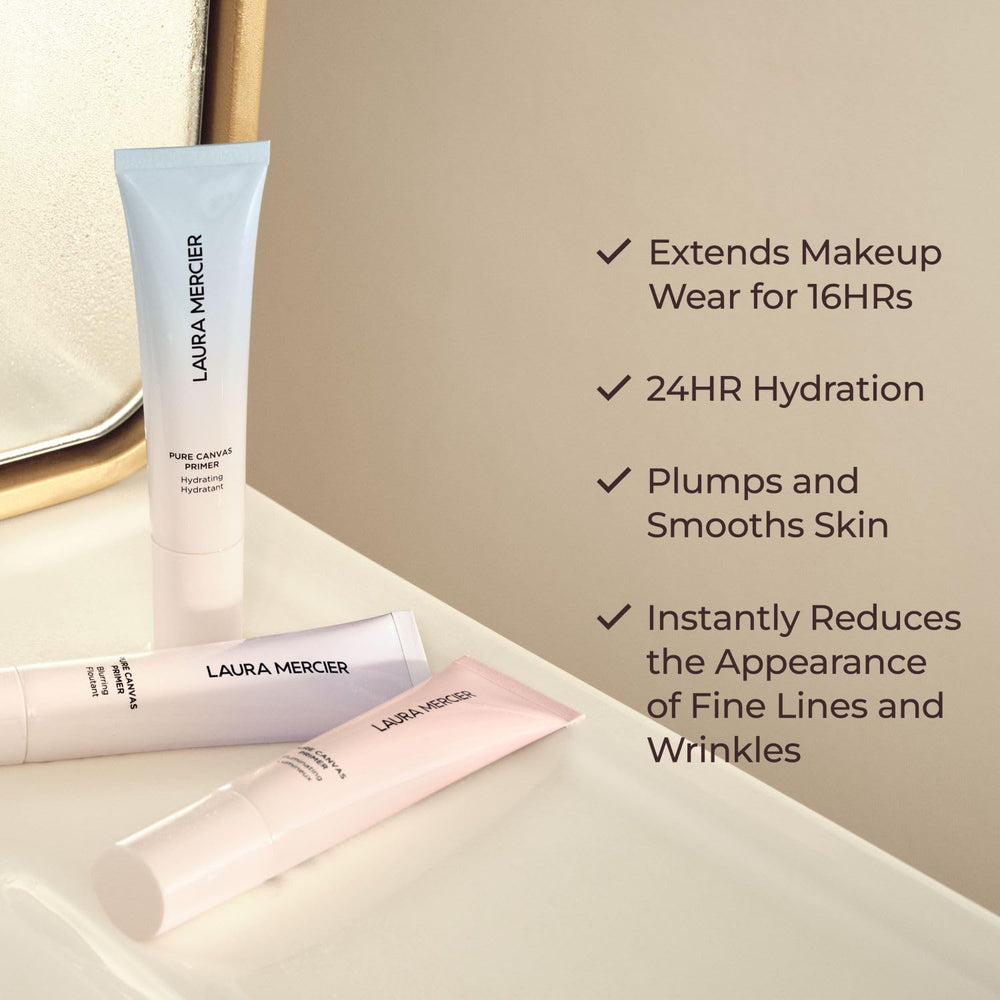 Laura Mercier applying primer on hand to preview smooth finish