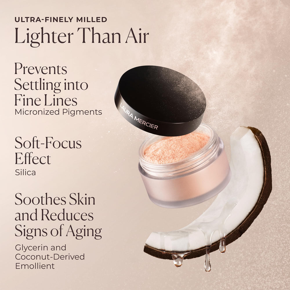 Laura Mercier powder in hand showing compact size for travel convenience