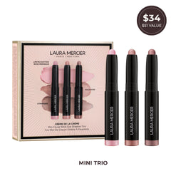 Laura Mercier uncapped sticks close-up showing creamy texture and smooth application