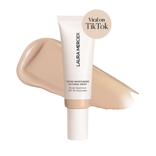 Laura Mercier tube cap detail highlighting secure closure and travel-friendly design