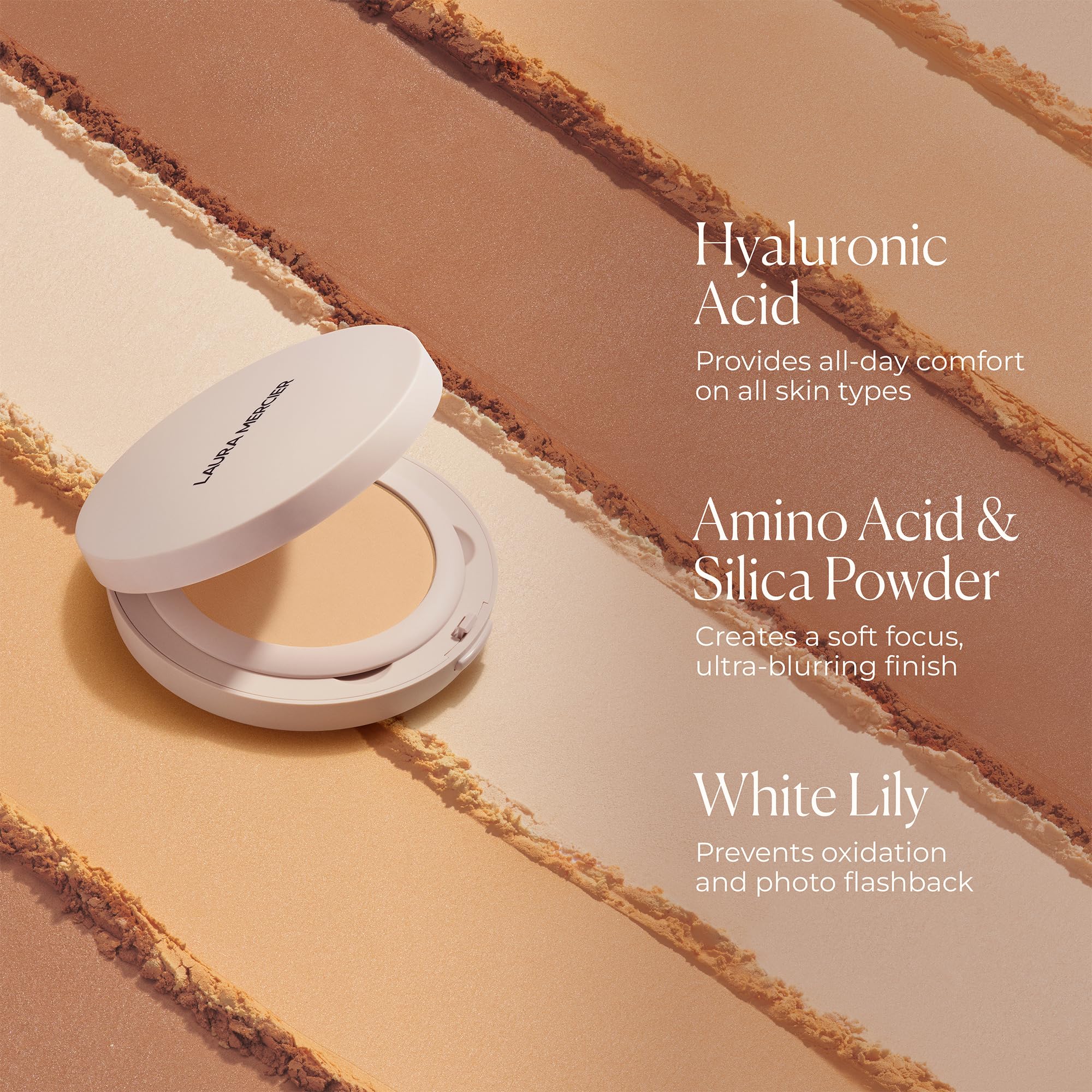 laura mercier compact beside common items showing portable size advantage