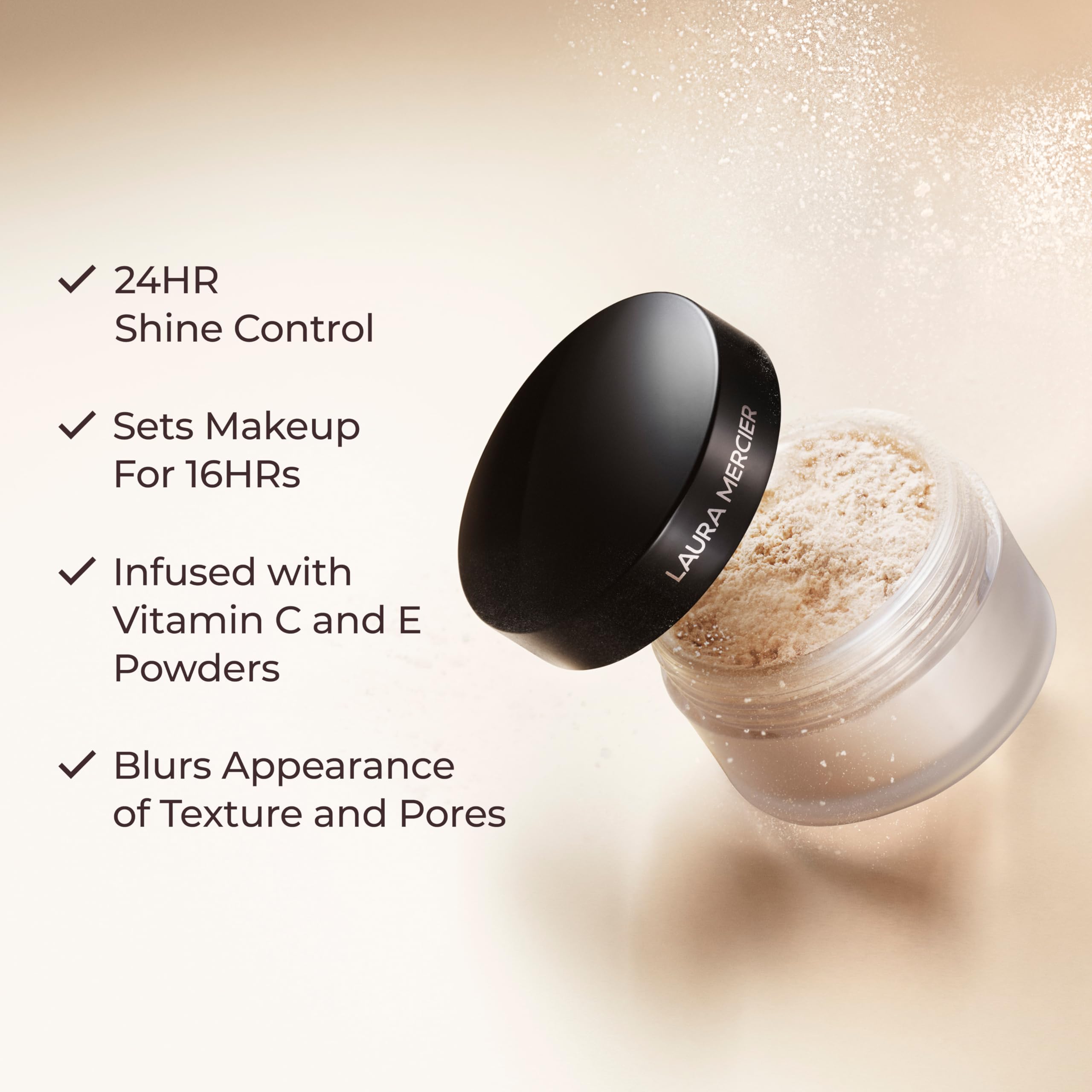 Laura Mercier velour puff picking up powder for even application benefit