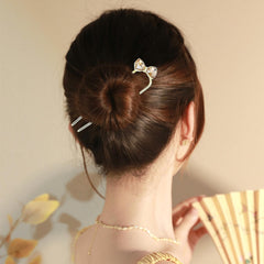 Lawie butterfly pendant angle showcasing delicate charm and feminine style