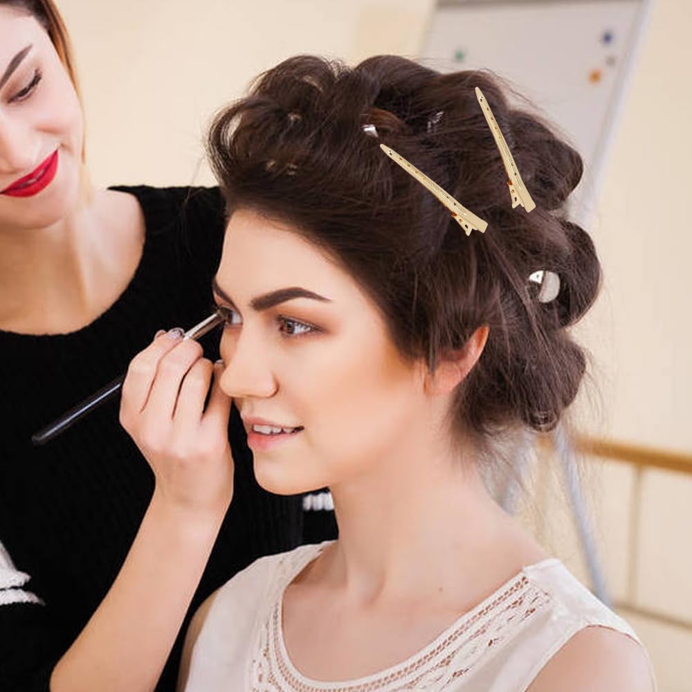Lawie clips holding hair during blow-dry for steady salon performance