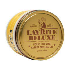 Layrite pomade applied in hair while styling, creates natural hold and shine