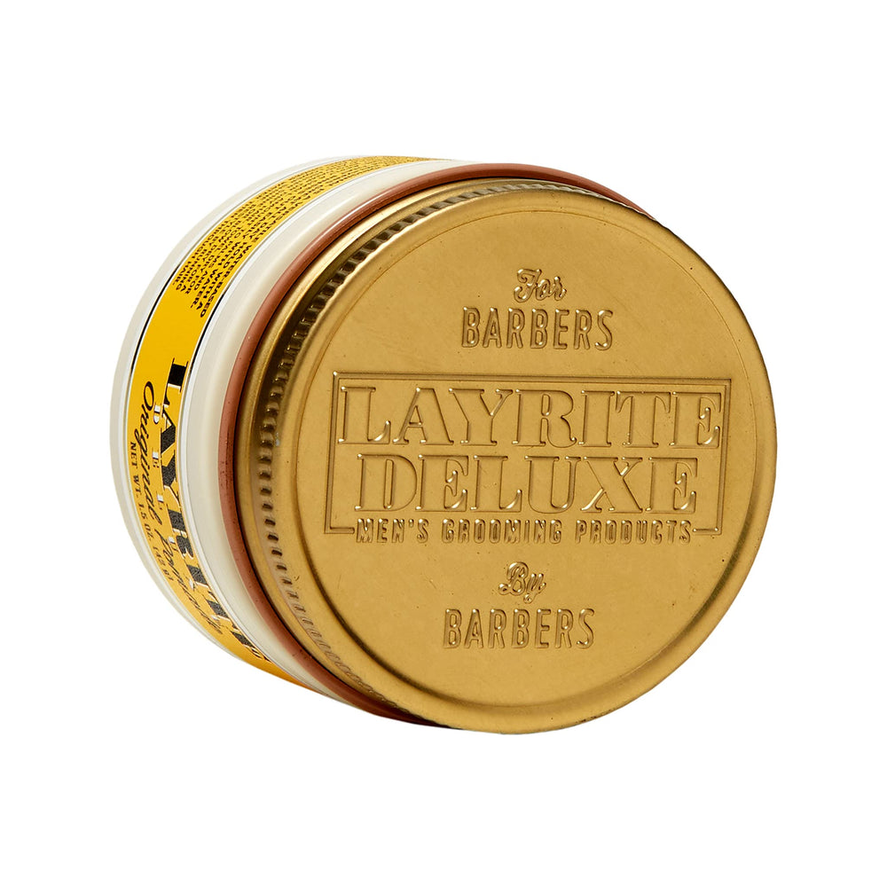 Layrite Original pomade being applied by hand demonstrating control and natural finish