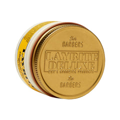 Layrite Original pomade being applied by hand demonstrating control and natural finish