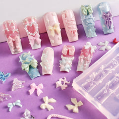 Close-up of Laza silicone mold cavities highlighting detailed bow and lace texture
