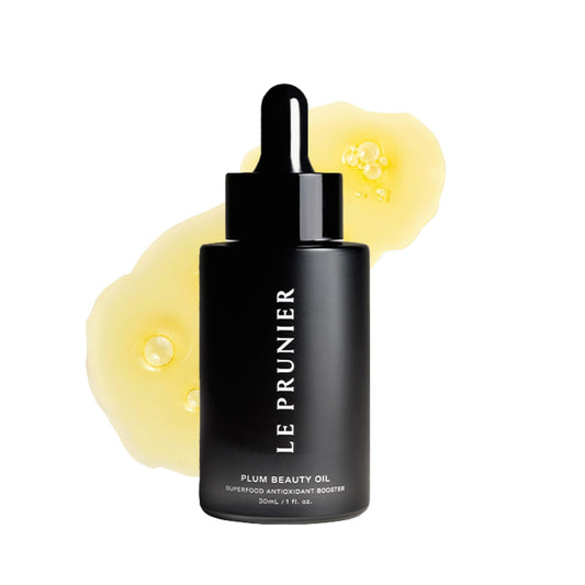 Le Prunier bottle front label showing clean plum oil packaging benefits