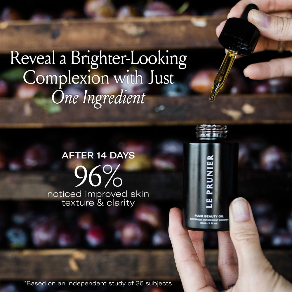 Wet hair ends treated with Le Prunier oil showing smoother, shinier tips