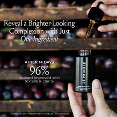 Wet hair ends treated with Le Prunier oil showing smoother, shinier tips