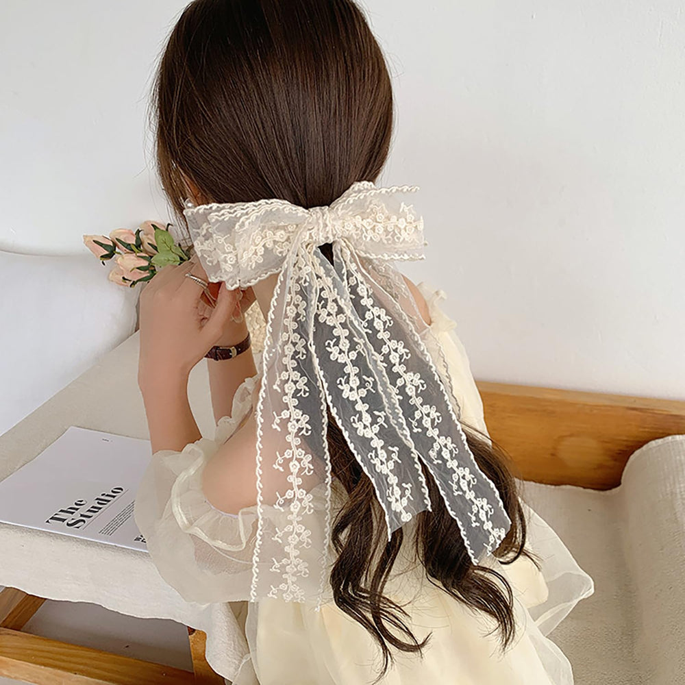 LEBEIGHT bow in wedding hairstyle setting adding refined charm to formal looks
