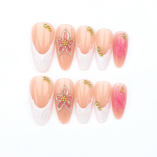 LFLSSTNM close-up of 3D floral texture and gilded beads, highlighting luxurious tactile detail