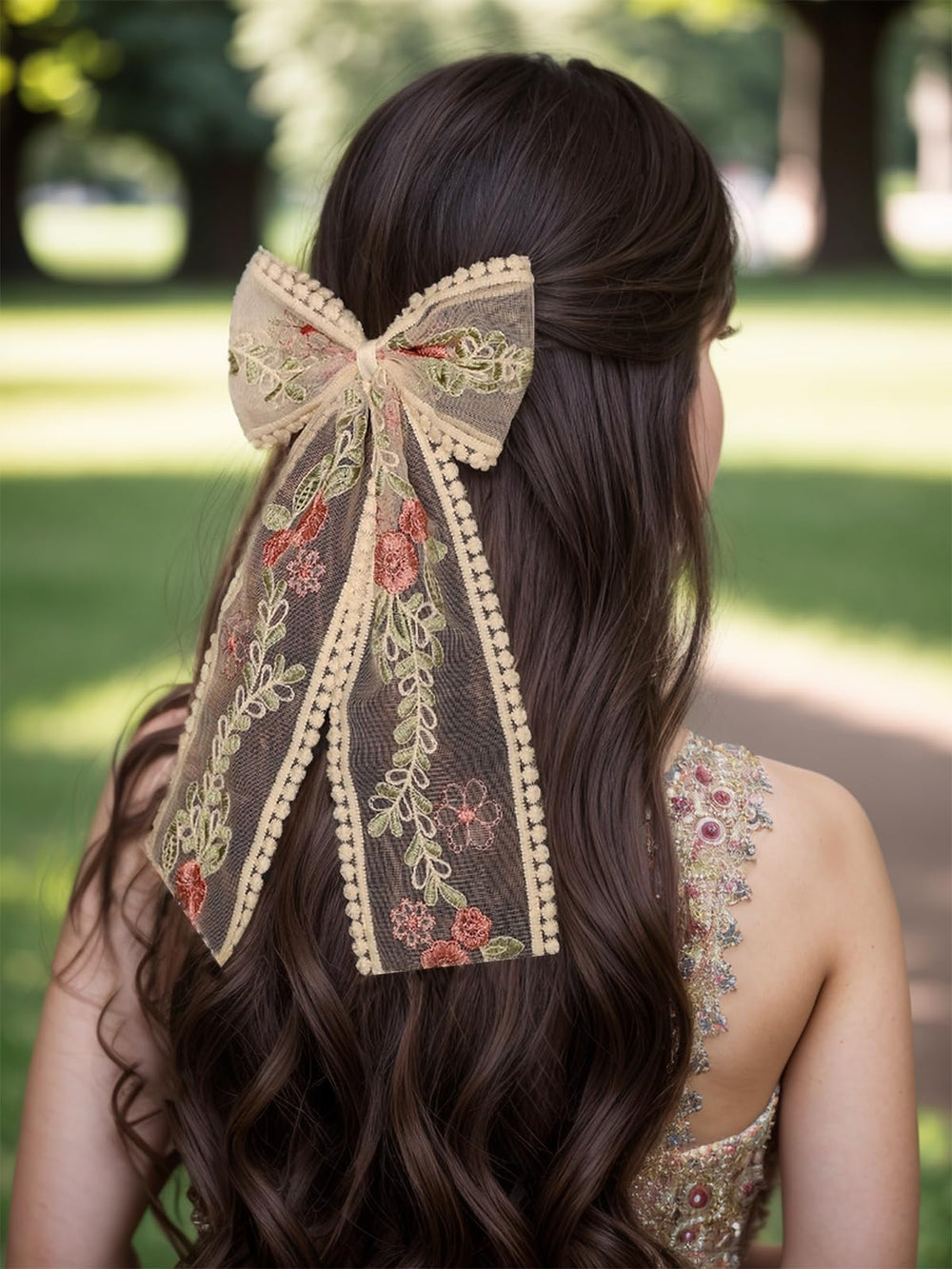 LFOUVRE bow long tails detail showing flowing tails for soft movement