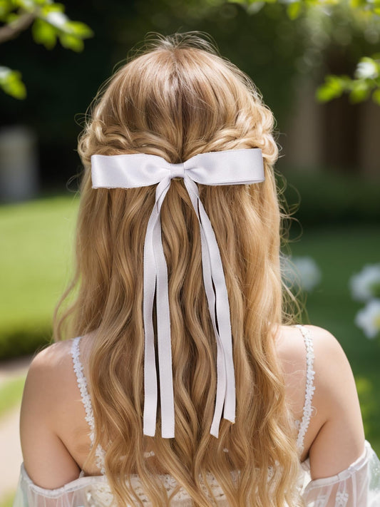 LFOUVRE close-up of bow texture highlighting ribbon quality and sheen