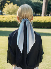 LFOUVRE close-up of satin knot highlighting smooth texture and gentle hold