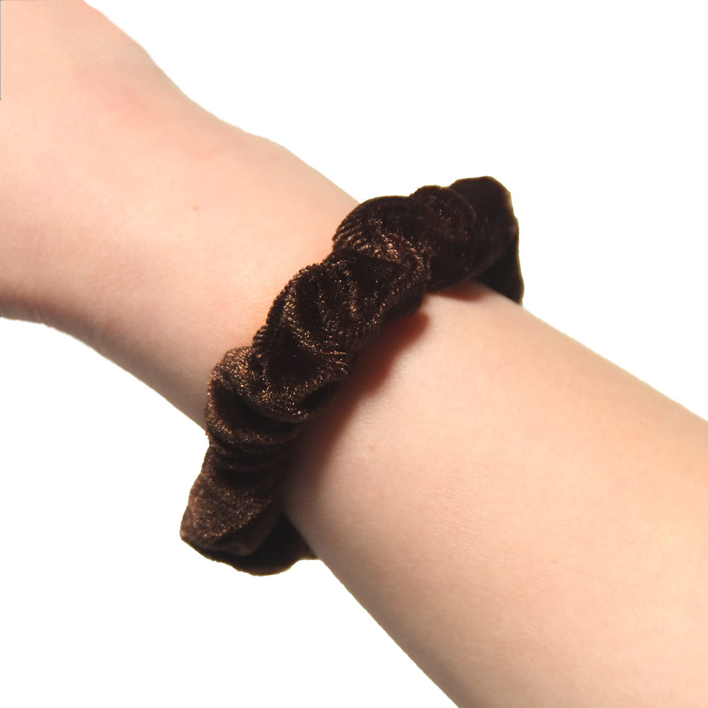 LFOUVRE scrunchie next to coin for scale to show compact 7 cm diameter
