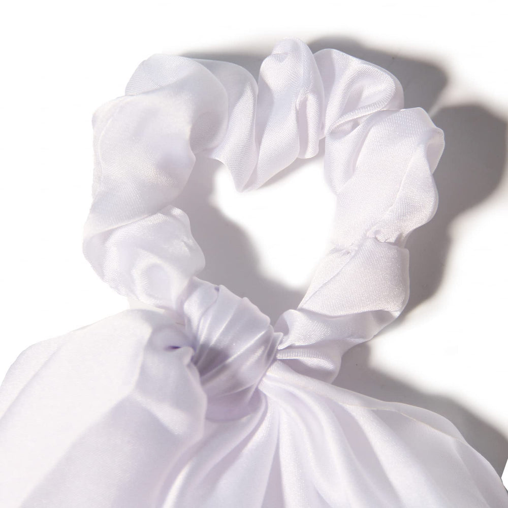 LFOUVRE ribbon tied to handbag as accessory benefit: coordinates outfit and bag