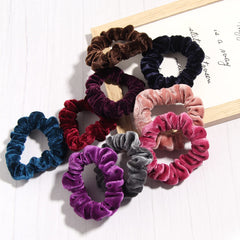 LFOUVRE scrunchie worn on wrist as accessory and backup tie