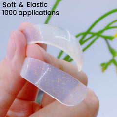 Liber Beauty shield next to ruler showing 1mm thinness for better lift coverage