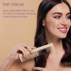 Person spritzing Life-Flo mist on face for instant refreshed skin