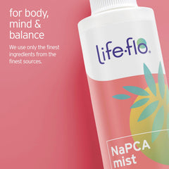Stylist applying Life-Flo mist to hair for added softness and shine