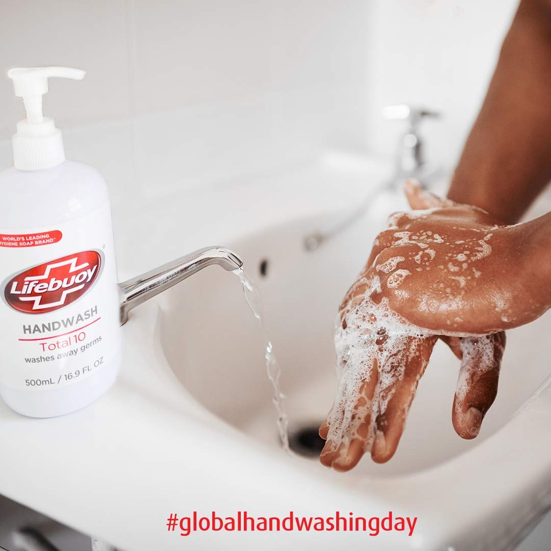 Lifebuoy 500ml bottle next to common items showing scale and long-lasting supply