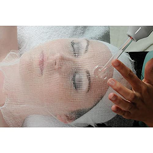 LIFESOFT gauze sheet next to hand showing full-face coverage and scale