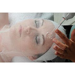 LIFESOFT gauze sheet next to hand showing full-face coverage and scale