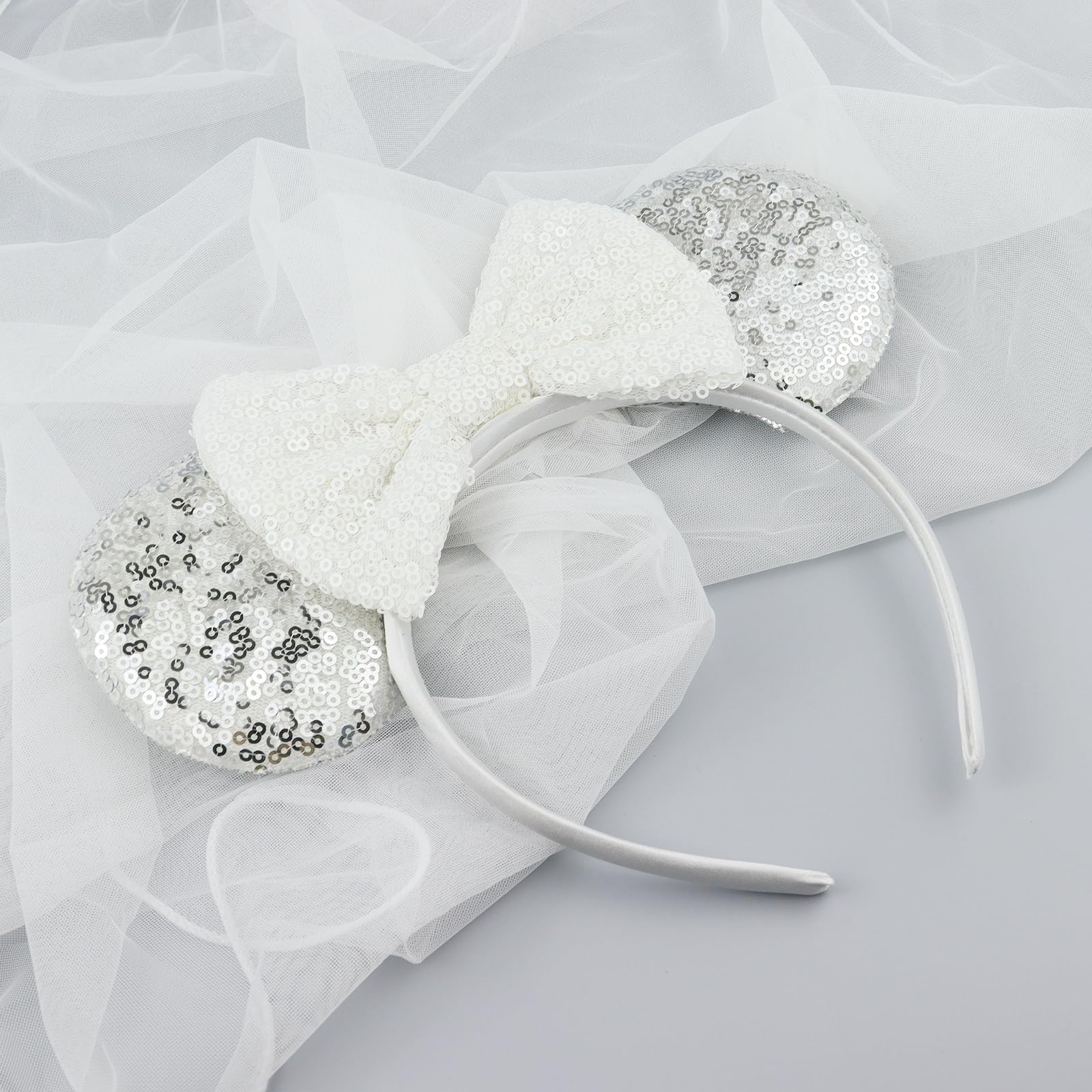 LIHELEI hand-held size comparison showing compact, travel-friendly headband