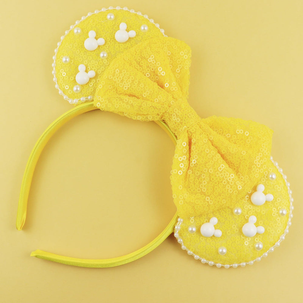 LIHELEI headband held in hand to show true-to-scale dimensions