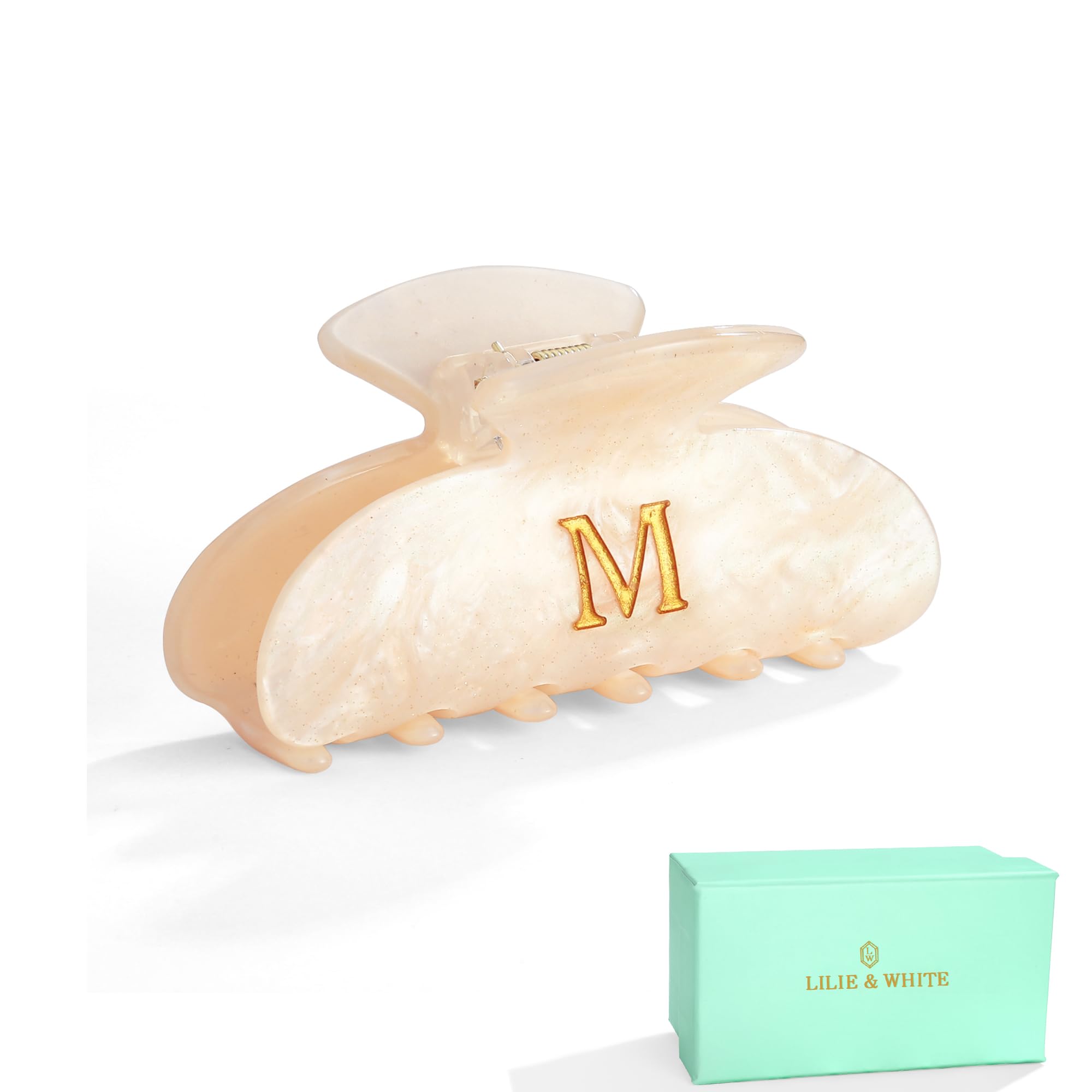 LILIE&WHITE front packaging showing gift-ready golden box and clip