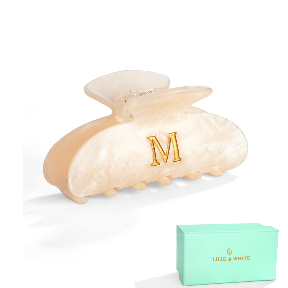 LILIE&WHITE front packaging showing gift-ready golden box and clip