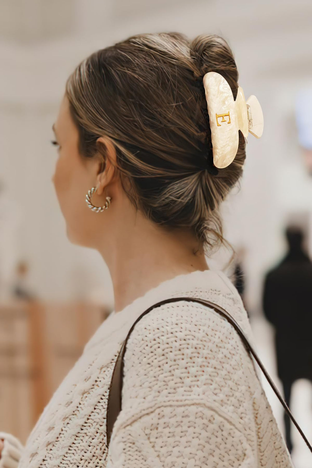 LILIE&WHITE clip worn in half-up hairstyle showing polished, everyday style
