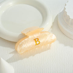 LILIE&WHITE clip on hand illustrating size and lightweight convenient carry