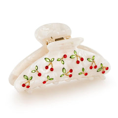 LILIE&WHITE front view of red cherry clip showing bold sparkle and secure hold