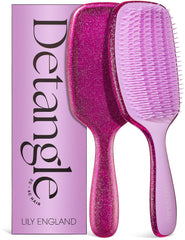 Lily England brush front view showing purple glitter and ergonomic grip for comfortable styling