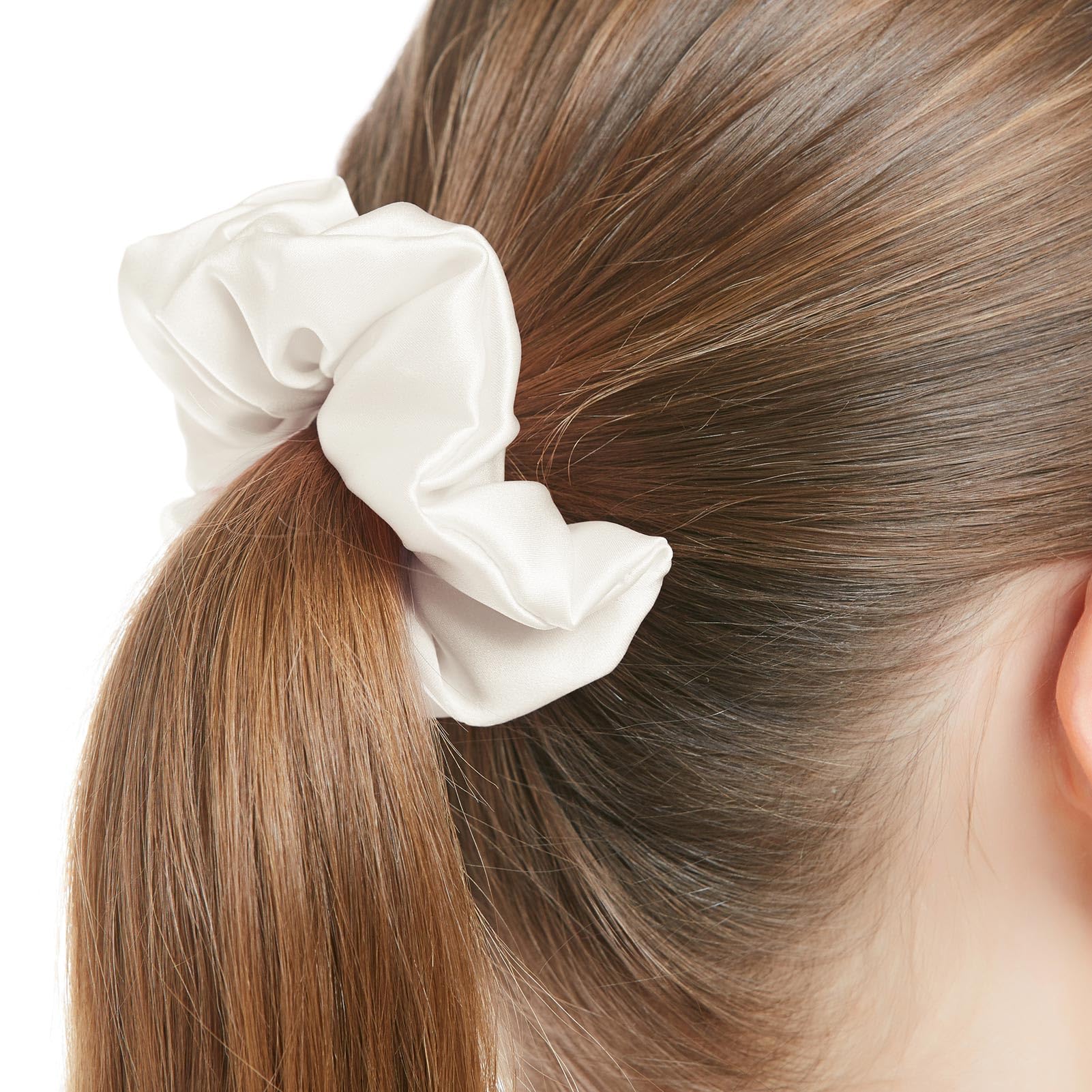 LilySilk scrunchie used in a loose bun showing minimal creasing and neat finish