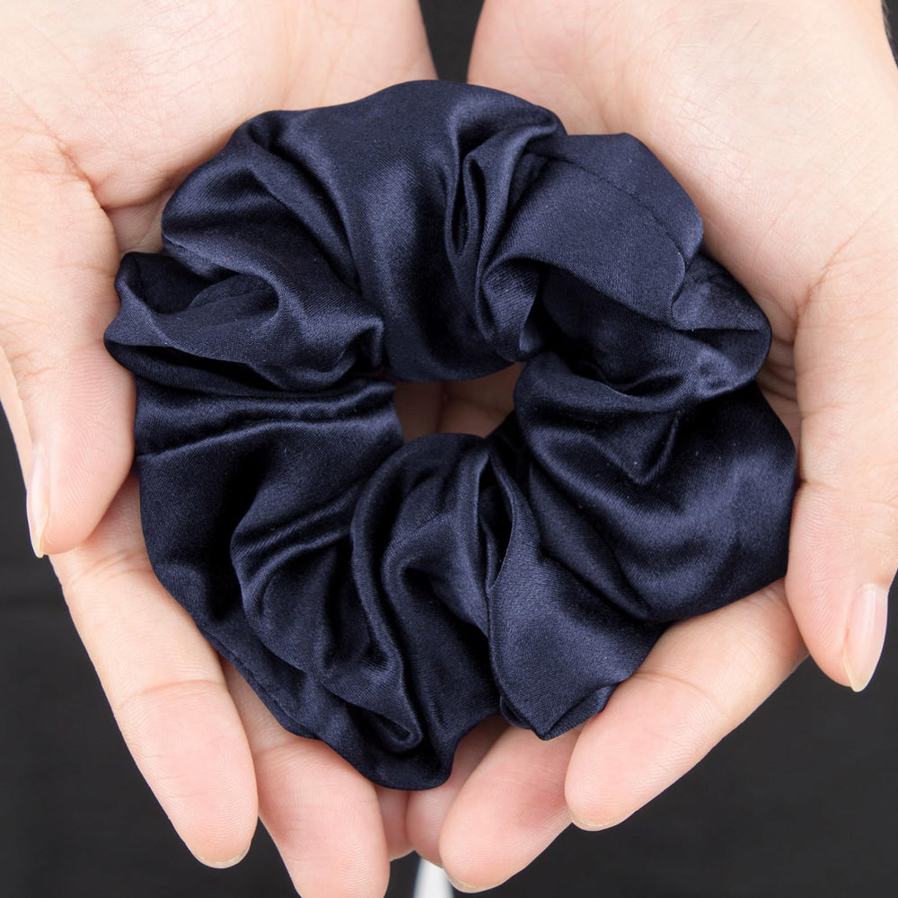 LILYSILK scrunchie on hand showing scale and easy, no-dent wearability